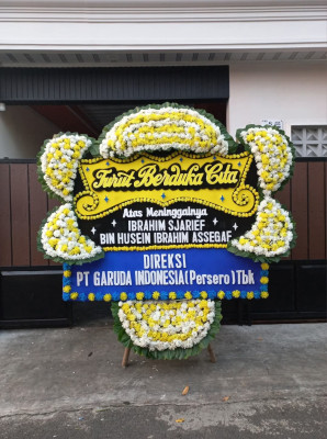 Papan Bunga Duka di Wonti
